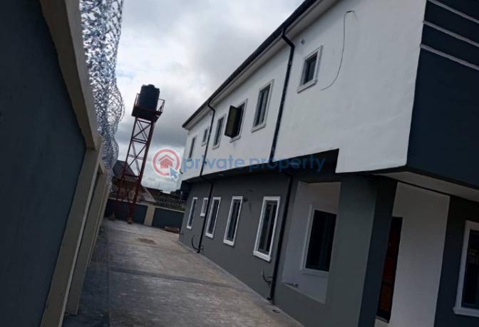 5 bedroom detached  duplex insuit with overhead tank.in a well secured estate - 2 5 bedroom Duplex For Sale Wtc Estate Enugu Area  - 2