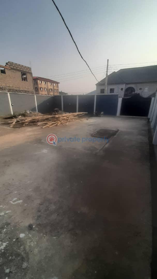 A 3 bedroom bungalow with 2 sitting room and 2 kitchen and a mini flat bq and an extra half plot of land. - 4 3 bedroom Detached Bungalow For Sale Iyana Ishashi Ojo Lagos - 4