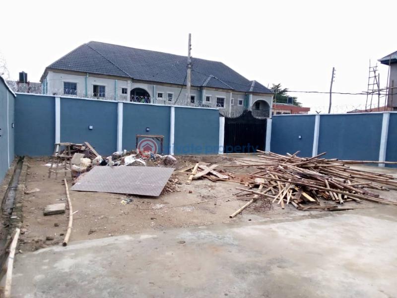 A 3 bedroom bungalow with 2 sitting room and 2 kitchen and a mini flat bq and an extra half plot of land. - 3 3 bedroom Detached Bungalow For Sale Iyana Ishashi Ojo Lagos - 3