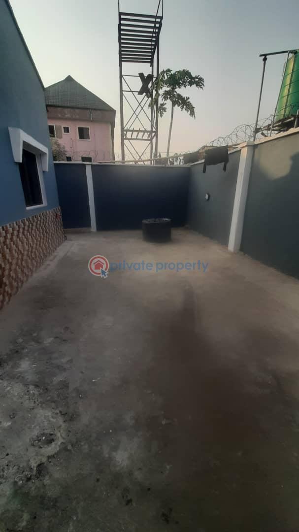 A 3 bedroom bungalow with 2 sitting room and 2 kitchen and a mini flat bq and an extra half plot of land. - 6 3 bedroom Detached Bungalow For Sale Iyana Ishashi Ojo Lagos - 6