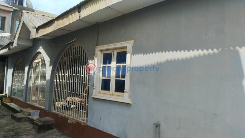 A block of 4 flats comprising of 2 units of 3 bedroom flats & 1 units of 2bedroom flats, and a 4bedroom laid back bungalow - 2 Block Of Flats For Sale Rofo Estate Odogunyan Ikorodu Lagos - 2