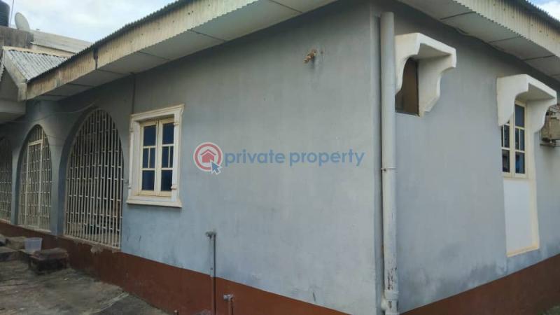 A block of 4 flats comprising of 2 units of 3 bedroom flats & 1 units of 2bedroom flats, and a 4bedroom laid back bungalow - 4 Block Of Flats For Sale Rofo Estate Odogunyan Ikorodu Lagos - 4
