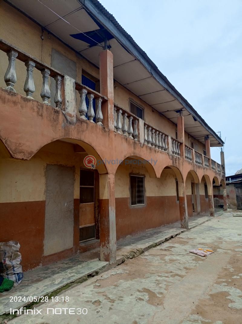 A plot of land with 8units of room & parlour self contained, 2units of a room self contained, and 2shops. - 4 Block Of Flats For Sale About 4buildings From Ijegun Ikotun Road, Iyana Isheri Bus Stop, Ikotun Ikotun/Igando Lagos - 4