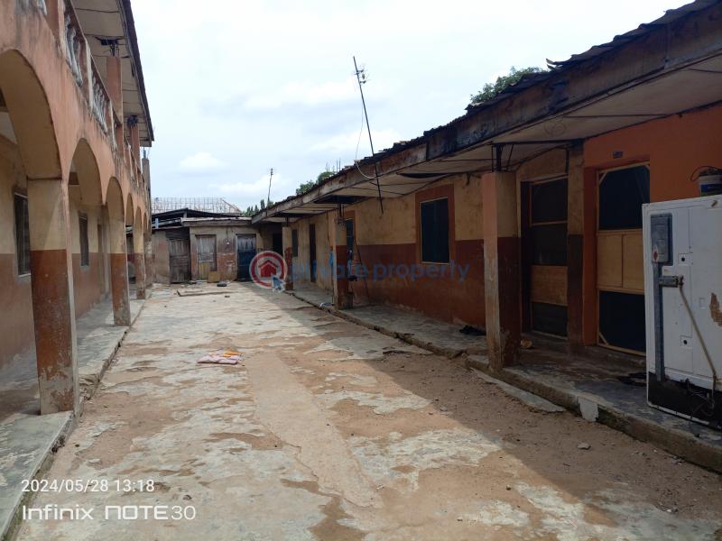 A plot of land with 8units of room & parlour self contained, 2units of a room self contained, and 2shops. - 2 Block Of Flats For Sale About 4buildings From Ijegun Ikotun Road, Iyana Isheri Bus Stop, Ikotun Ikotun/Igando Lagos - 2