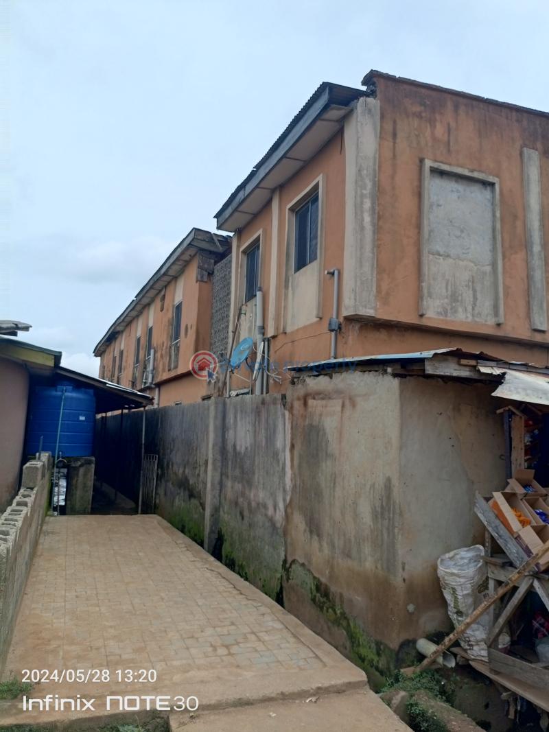A plot of land with 8units of room & parlour self contained, 2units of a room self contained, and 2shops. - 1 Block Of Flats For Sale About 4buildings From Ijegun Ikotun Road, Iyana Isheri Bus Stop, Ikotun Ikotun/Igando Lagos - 1