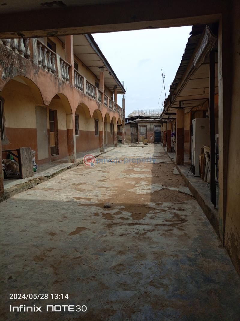 A plot of land with 8units of room & parlour self contained, 2units of a room self contained, and 2shops. - 5 Block Of Flats For Sale About 4buildings From Ijegun Ikotun Road, Iyana Isheri Bus Stop, Ikotun Ikotun/Igando Lagos - 5