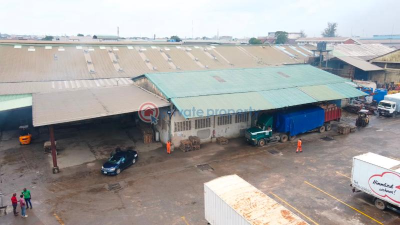Factory For Sale Total Land Area: 16,570 Sqm * Existing Warehouse Space: 9,453.19 Sqm * Open/unused Space: 6,951.11 Sqm * Additional Administrative Block: 437sqm Ikeja  Lagos - 1