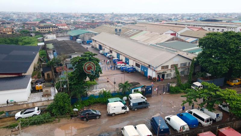 Factory For Sale Total Land Area: 16,570 Sqm * Existing Warehouse Space: 9,453.19 Sqm * Open/unused Space: 6,951.11 Sqm * Additional Administrative Block: 437sqm Ikeja  Lagos - 3